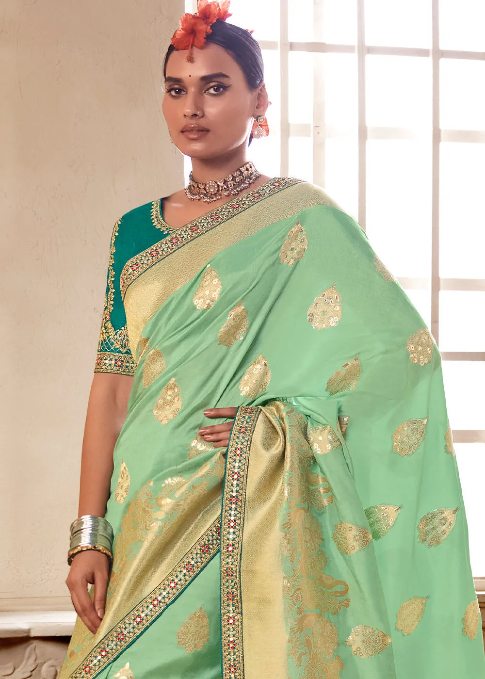 Pastel Green Woven Dola Silk Saree with Contrast Embroidered Border