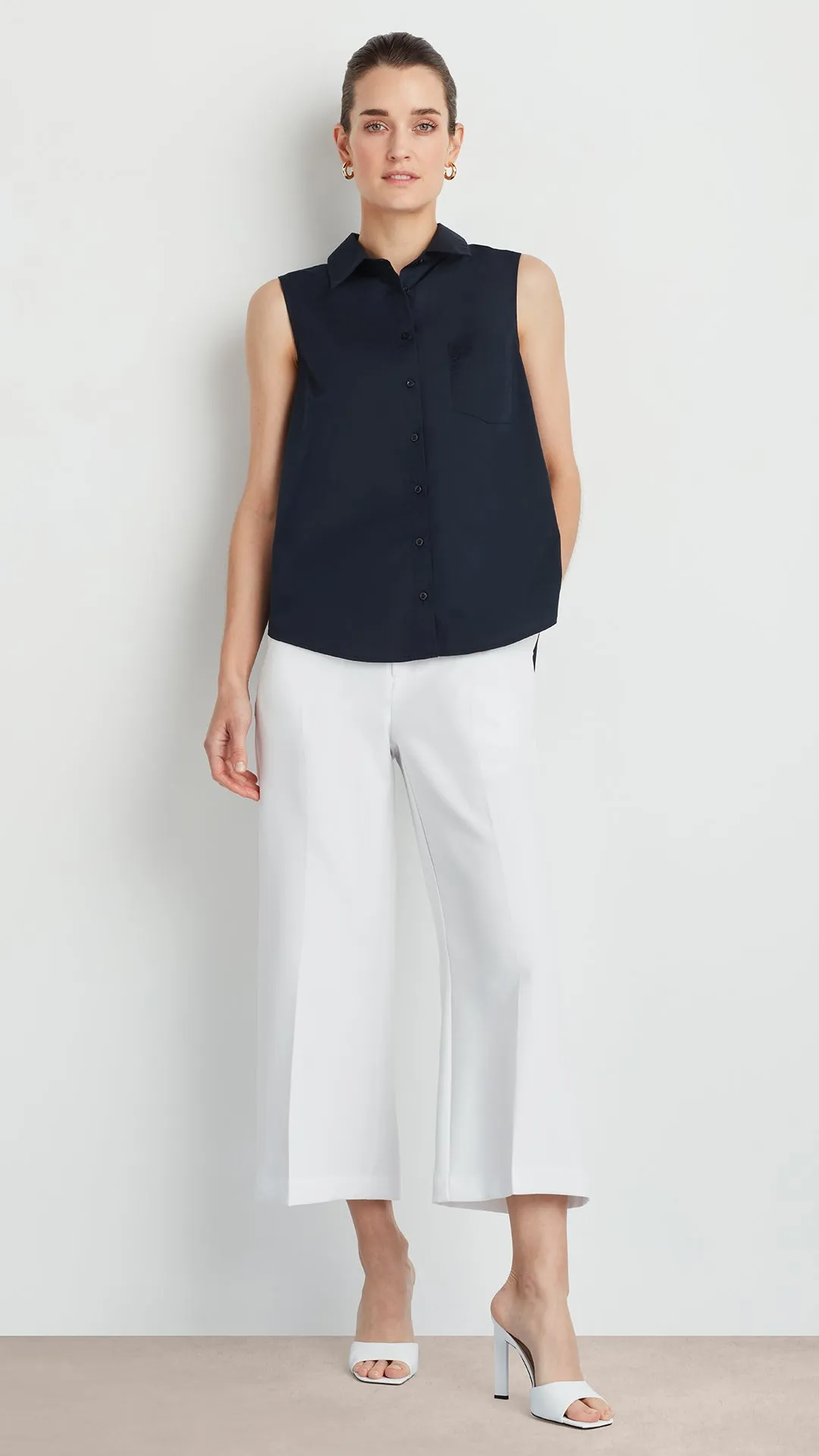 SLEEVELESS PLEATED POPLIN SHIRT